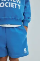 TNS_Logo_Short_Iris_Whisper_Blauw_2