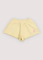 TNS_Logo_Short_Soft_Lemon_Geel