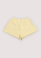 TNS_Logo_Short_Soft_Lemon_Geel_1